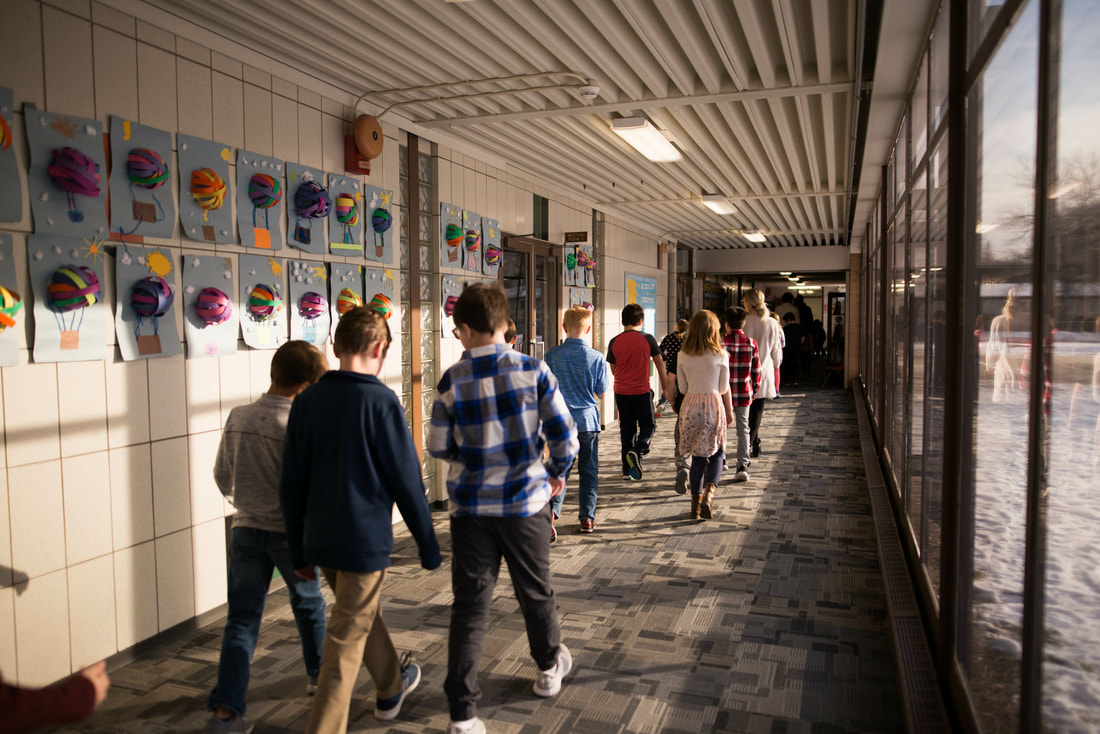 Kids Walking in the Hallway